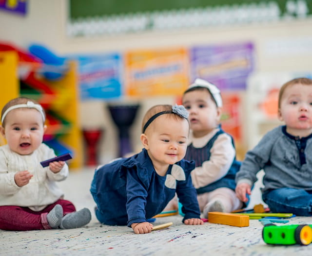 a group of children playing with toys