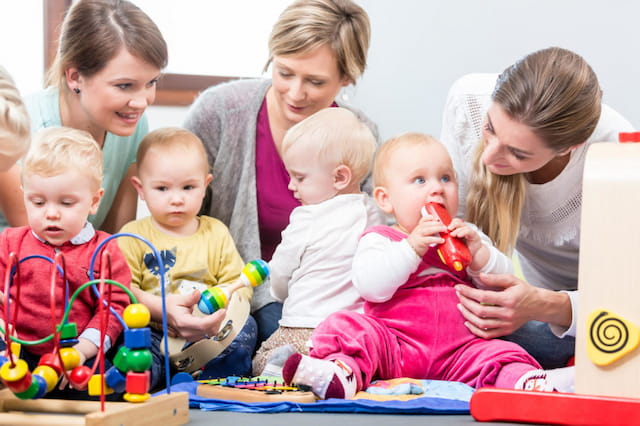 a group of children playing with toys