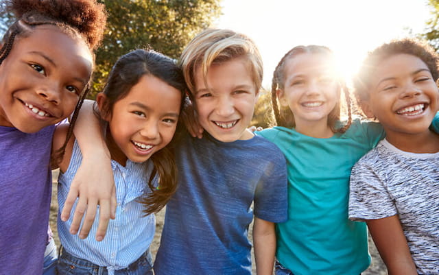 a group of girls smiling