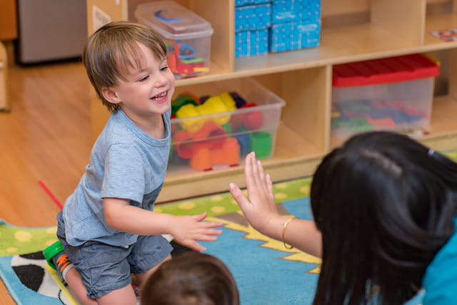 a group of children playing on the floor