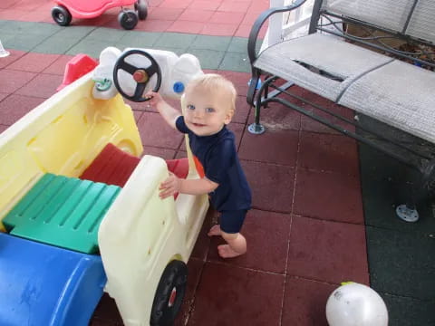 a baby playing with toys