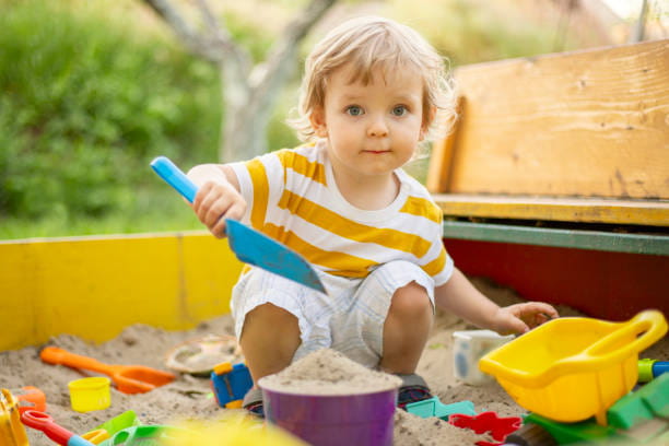 a baby playing with toys