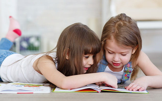 a few young girls studying