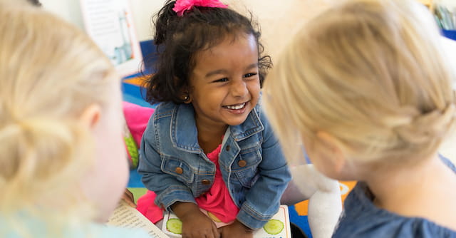 a group of children sitting together