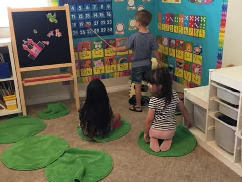 children playing on a mat
