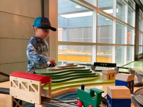 a boy playing with toys
