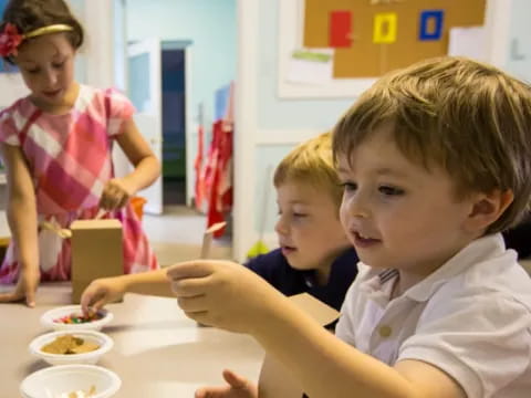 a group of children eating