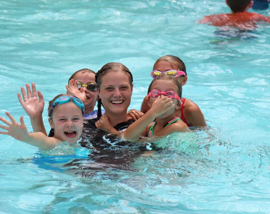 a group of people in a pool