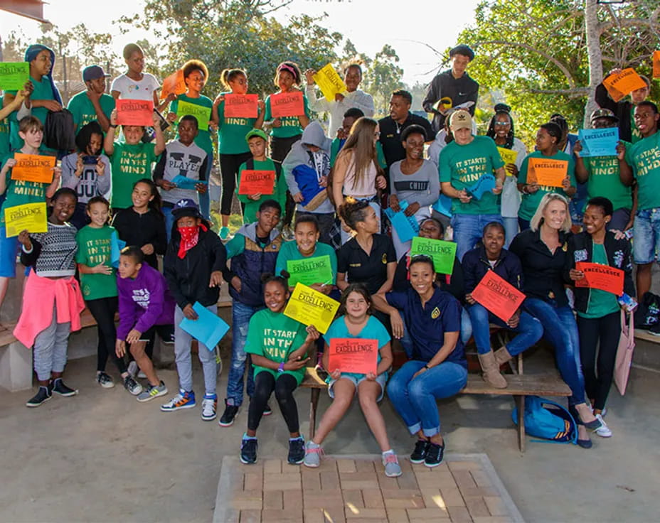 a group of people posing for a photo