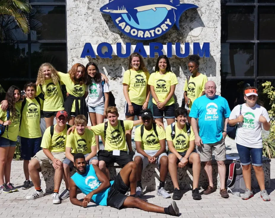 a group of people posing for a photo