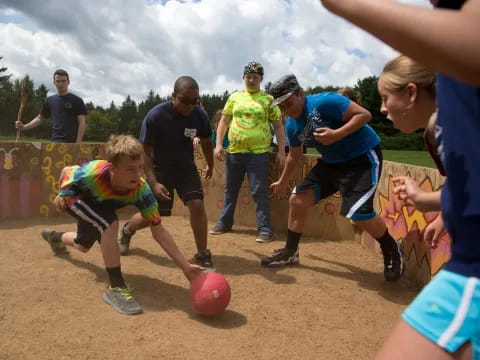 a group of people playing football