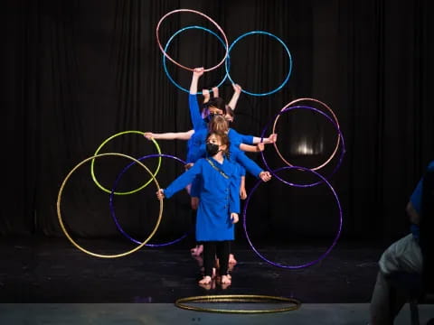 two girls holding hoops