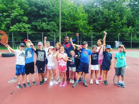 a group of kids posing for a photo