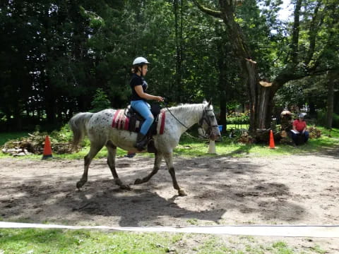 a man riding a horse