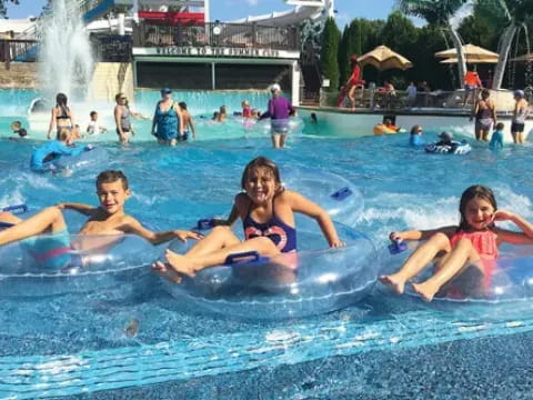 a group of people in a pool