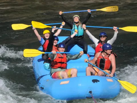 a group of people in a raft