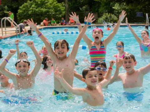 a group of people in a pool