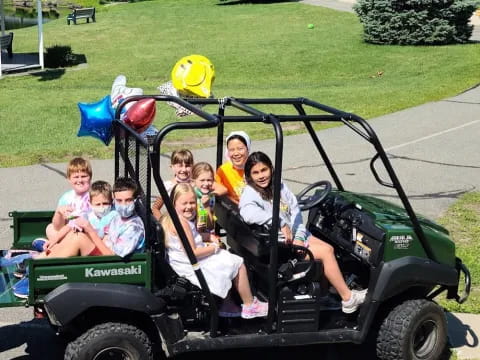 a group of people in a vehicle