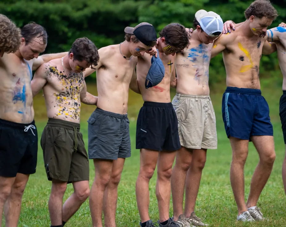 a group of men in shorts