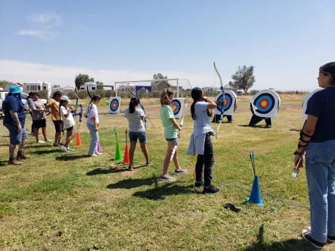 a group of people holding signs