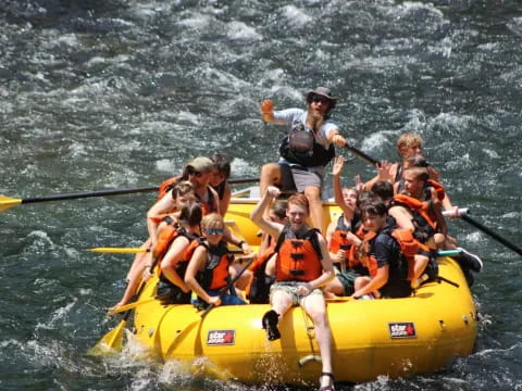 a group of people in a raft