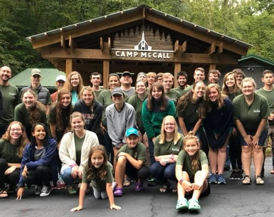 a group of people posing for a photo