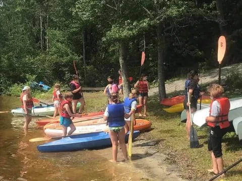 a group of people in a river