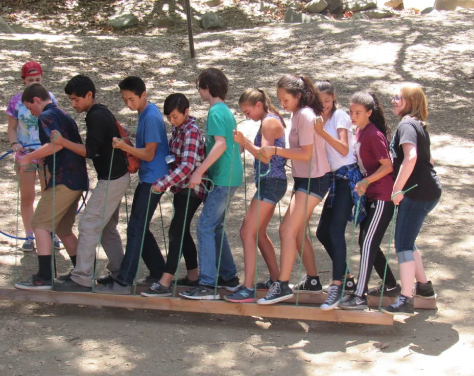 a group of people standing in a line