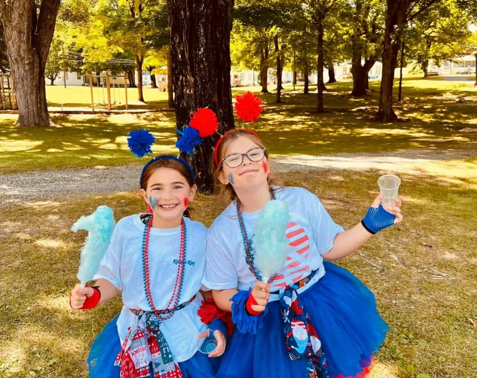 two girls wearing clothing