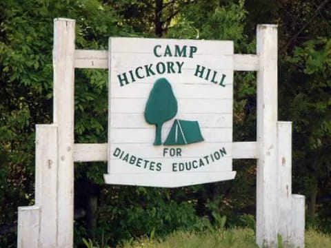 a sign on a wooden fence