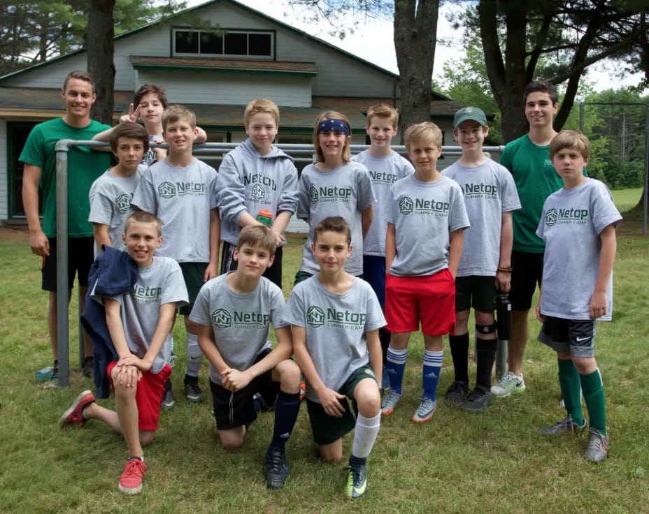 a group of people posing for a photo