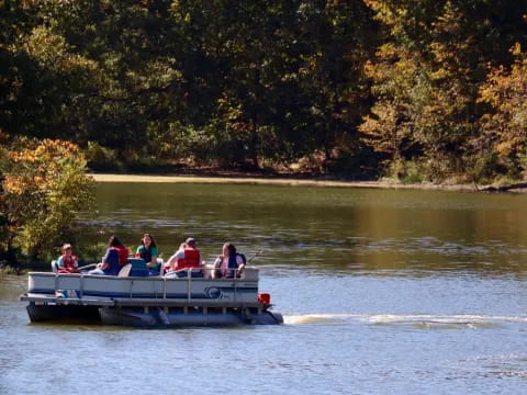 a group of people ride a boat