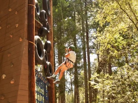a man climbing a wall