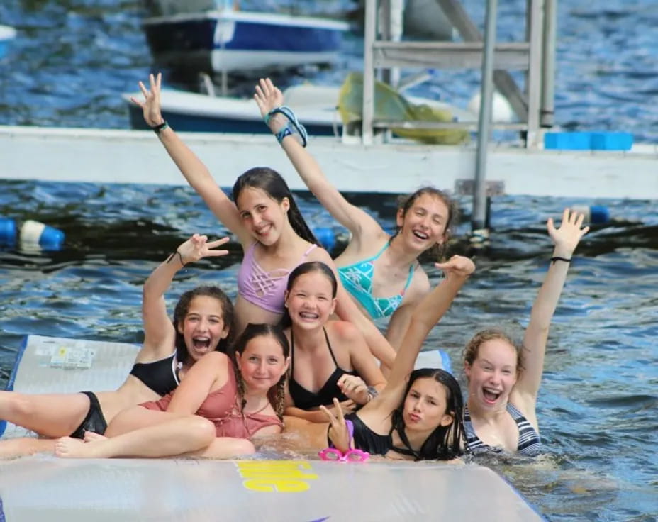 a group of people in a pool