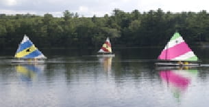 a group of colorful umbrellas in the water