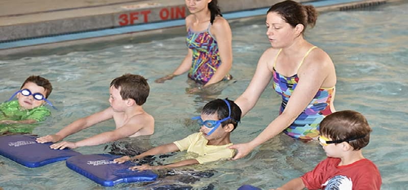 a group of people in a pool