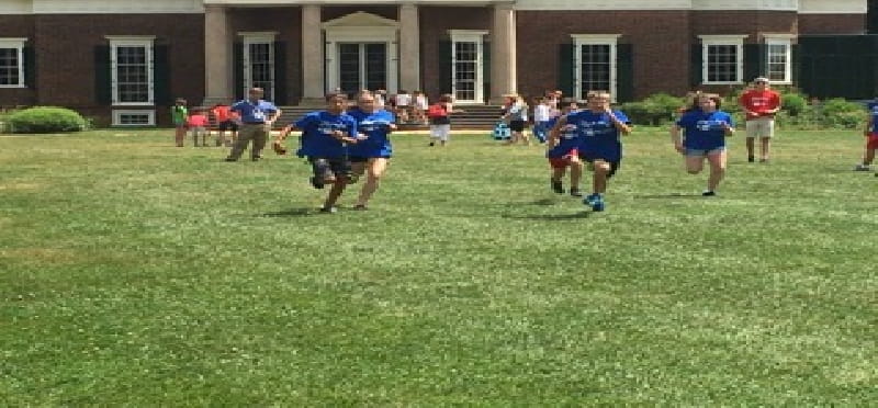 a group of people playing football