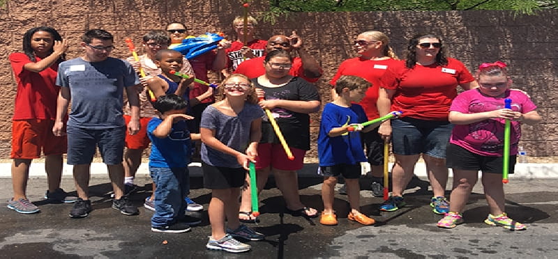 a group of people posing for a photo