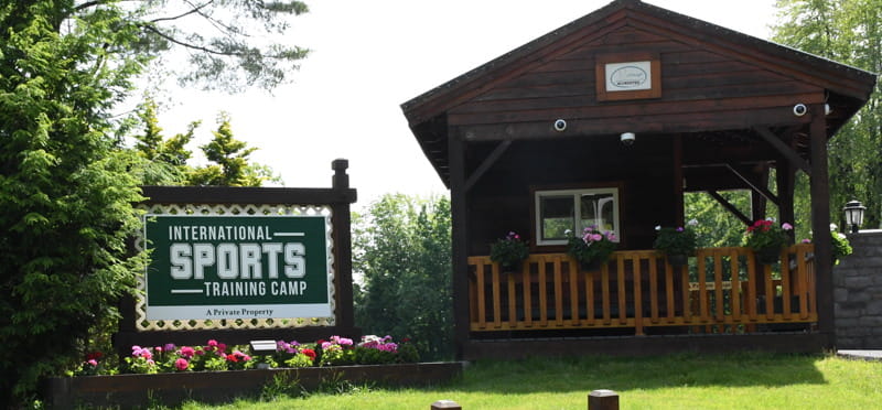 a sign in front of a house