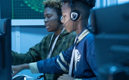 a couple of men wearing headphones