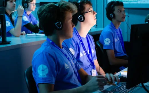 a group of people wearing headsets