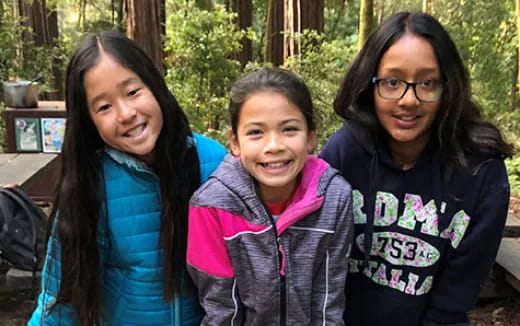 a group of girls smiling