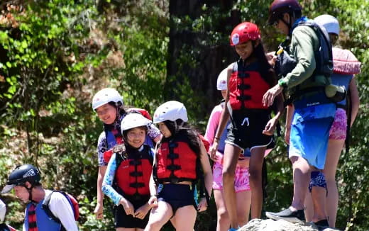 a group of people wearing helmets