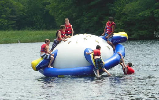 a group of people on a raft
