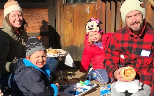 a family sits around a table