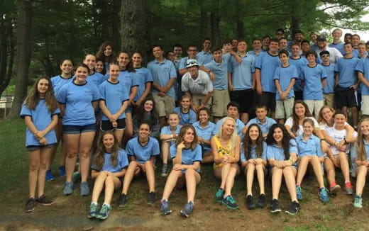 a group of people posing for a photo