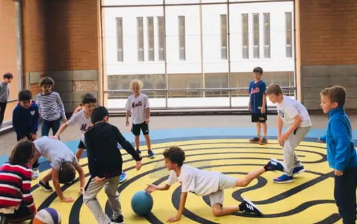 a group of people playing football