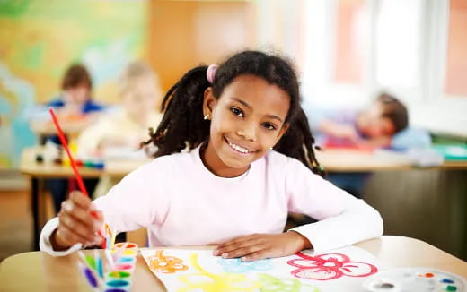 a young girl smiling