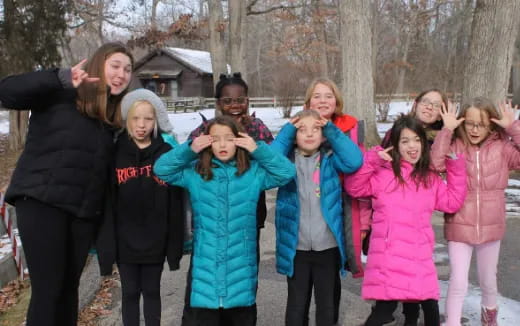a group of people posing for a photo