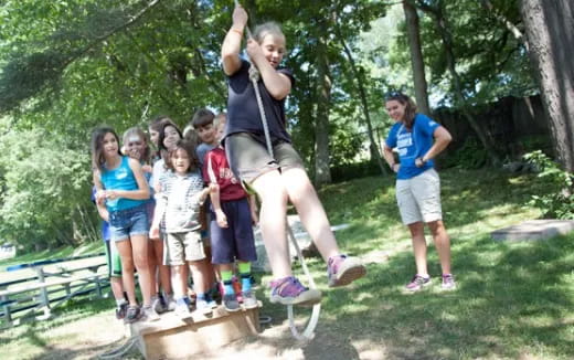 a group of kids posing for a photo